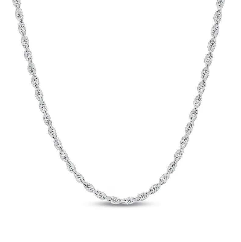 Silver rope chain necklace on a white background