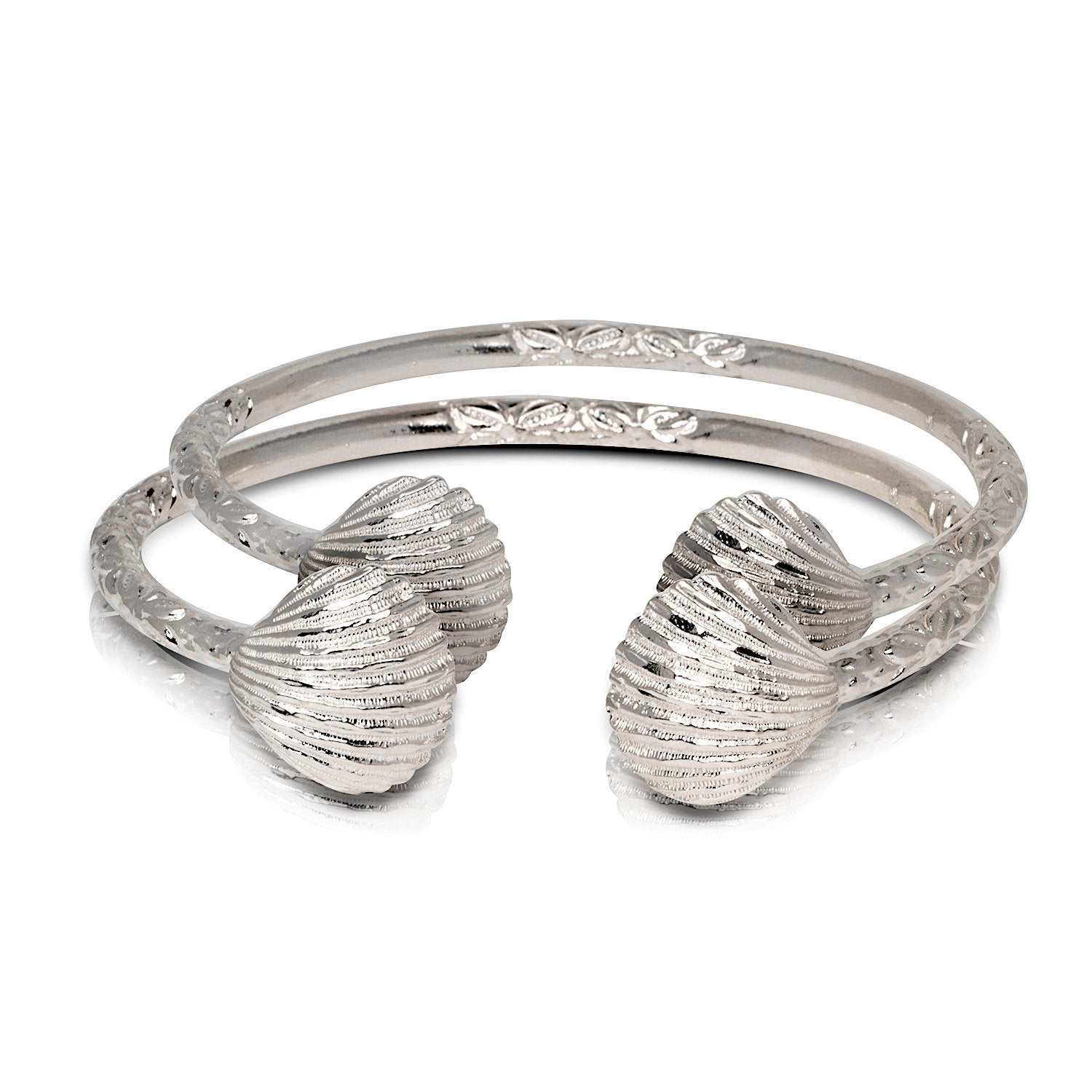 A pair of scallop sea shell .925 sterling silver West Indian bangles, 8 inches in size, handmade in Brooklyn. Elegant and polished, presented in a gift box.